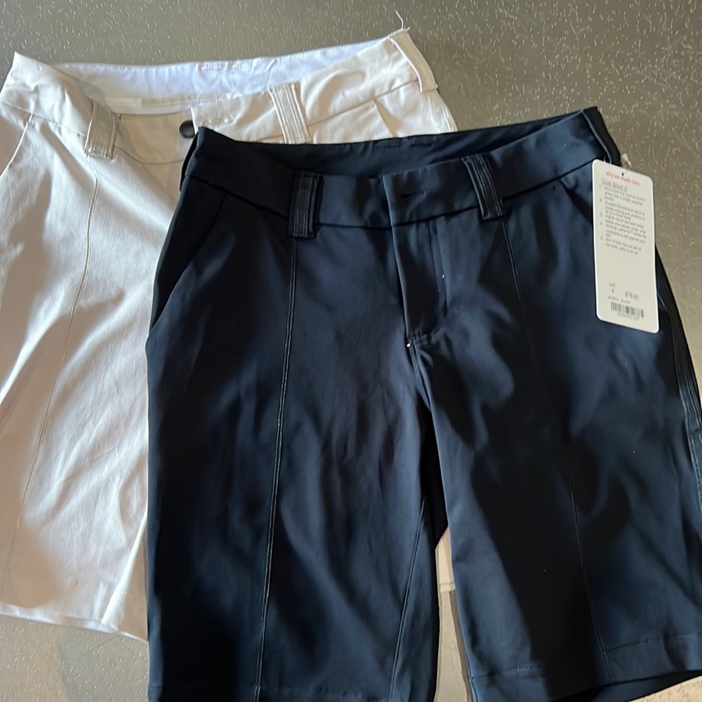 Lululemon club short II, size 4…. Black one is NWT, beige pair is NWOT